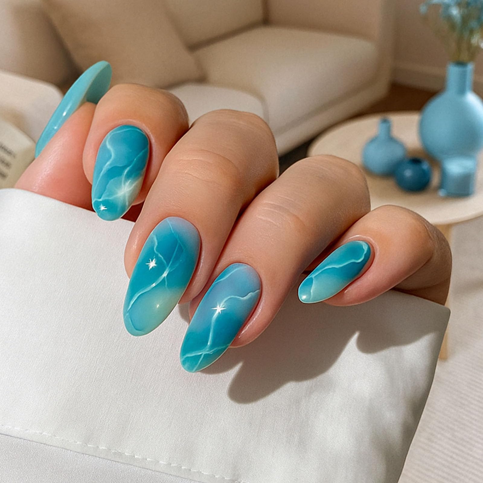 Gradient Turquoise Marbled Wave Press On Nails With Sparkling Star Accents Almond Shaped