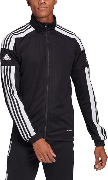 Primer plano de la cremallera frontal y el detalle del logo de adidas en la chaqueta de entrenamiento Squadra 21.