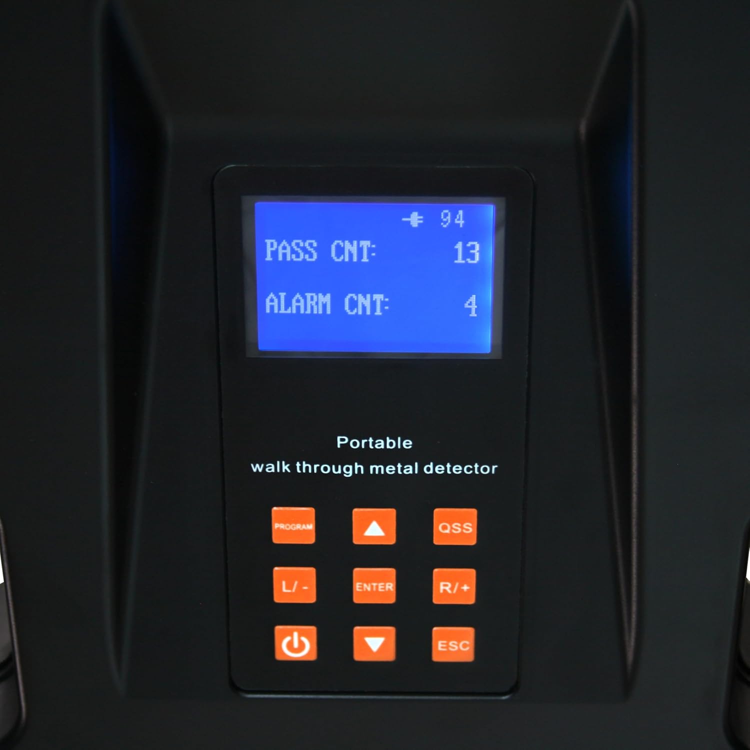 Close-up of the metal detector's control panel with display and buttons.