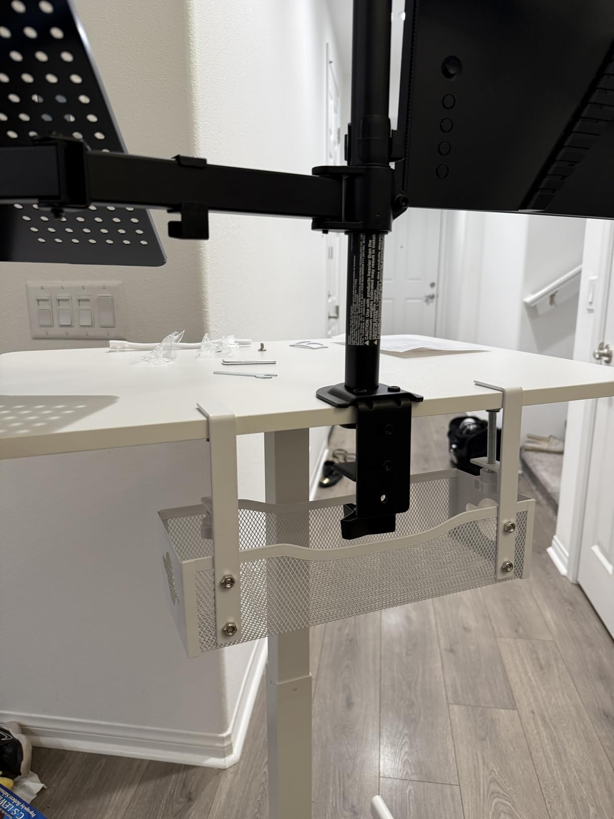 Assembled cable tray installed under the desk, back view