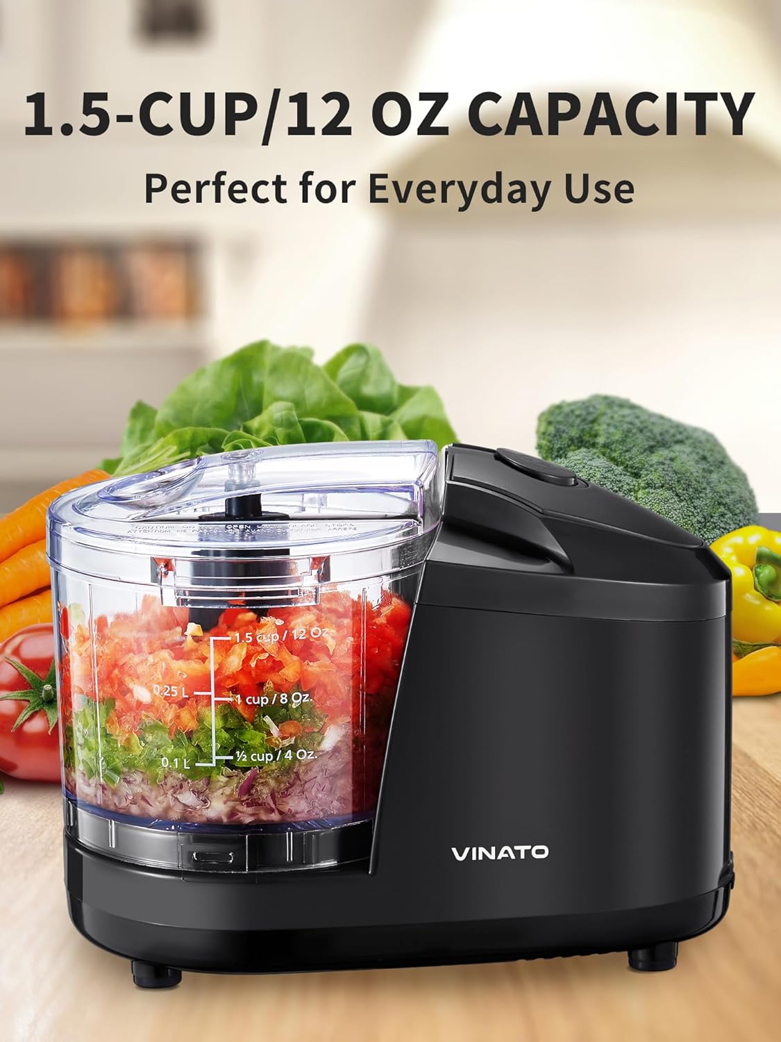 VINATO Electric Food Chopper with chopped vegetables inside, showing the 1.5-cup / 12 oz capacity markings.