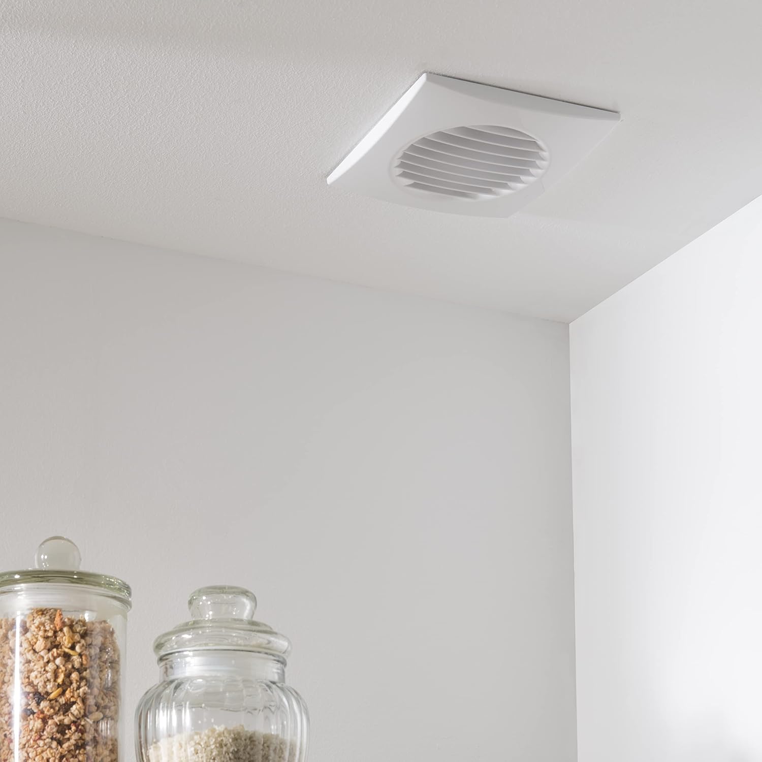 EQUATION SLIM Bathroom Fan installed on a ceiling in a kitchen setting