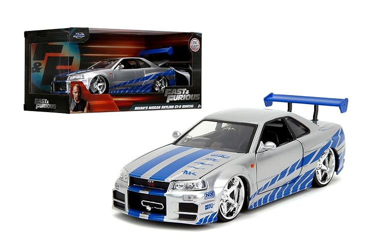 Jada Toys Fast & Furious Brian’s 2002 Nissan Skyline R34 Coche Die-cast, Escala 1:24, Plata y Azul, 19808