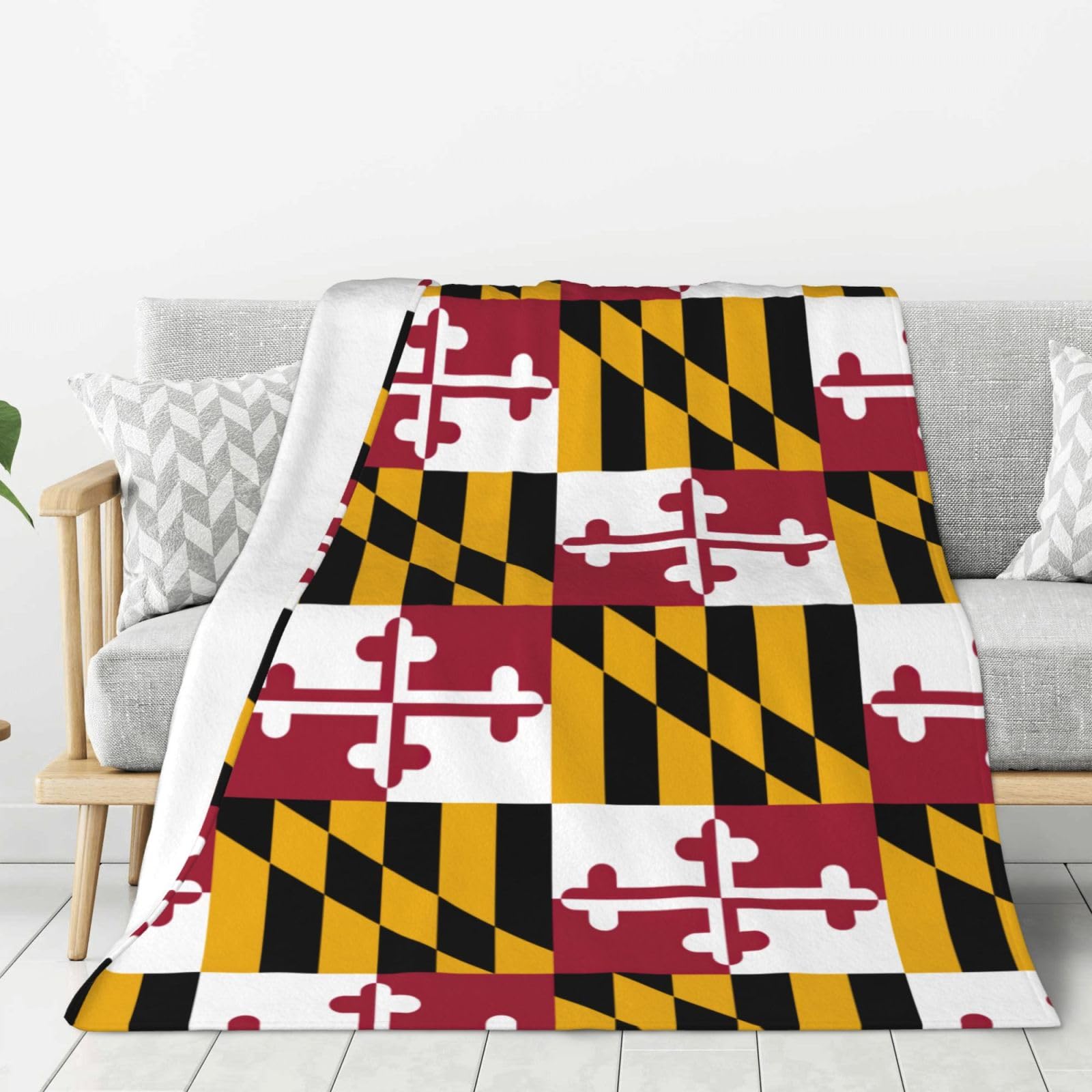 Couverture flanelle Maryland chaude contre le froid sur le lit
