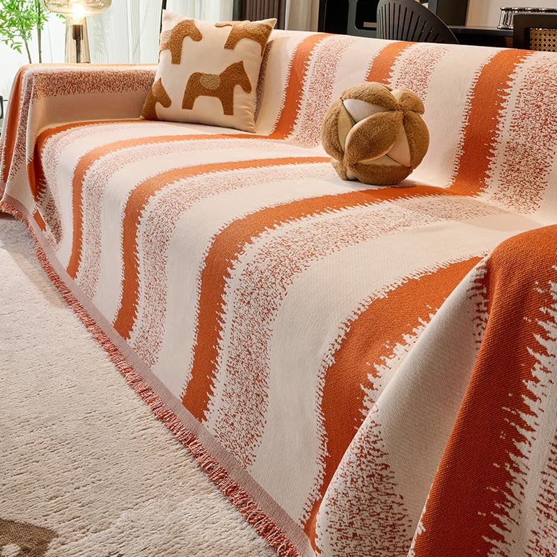 Housse de canapé lavable orange pour embellir votre salon chaleureux
