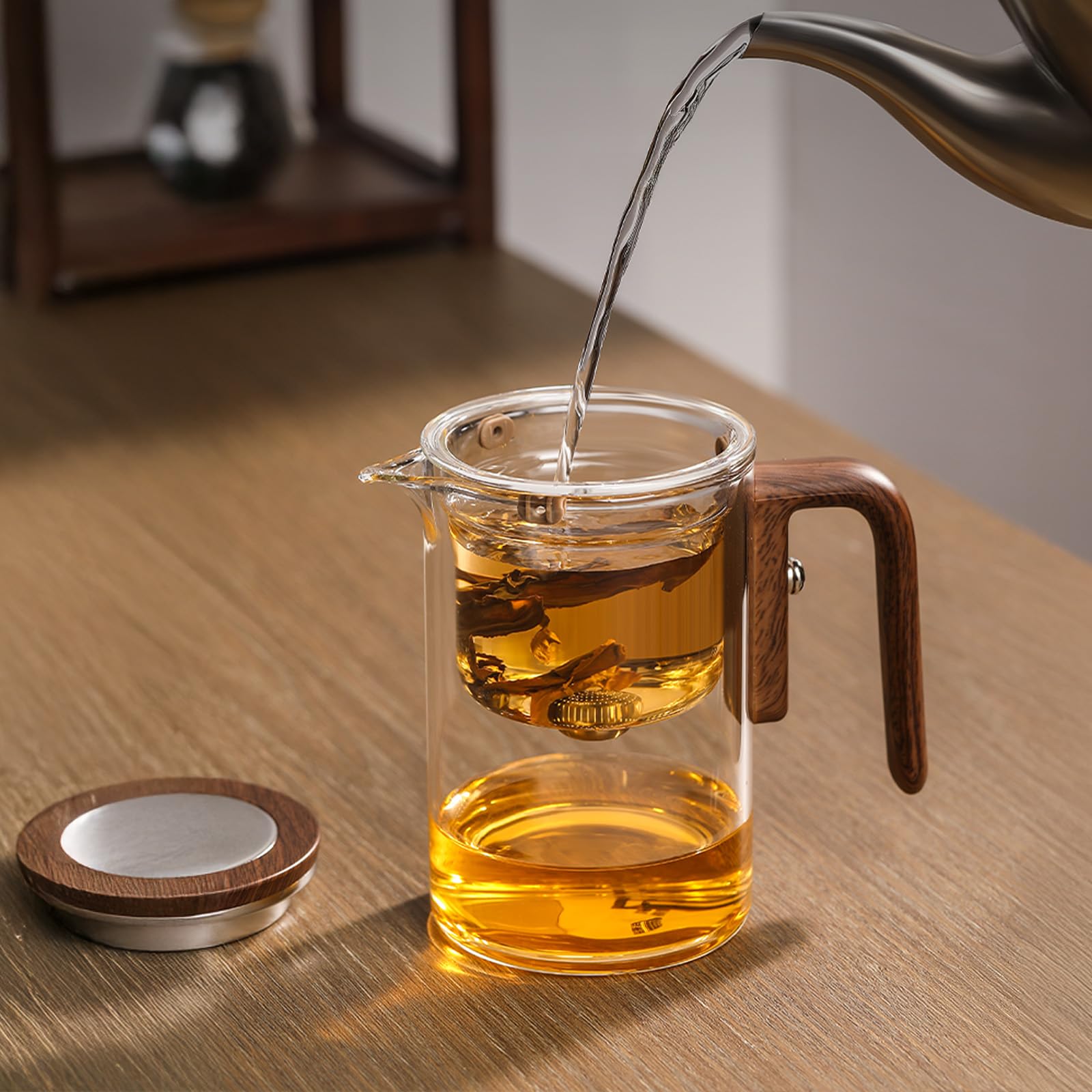 Teiera magica con manico, teiera in vetro separata per separare l'acqua del tè, design ergonomico in silicone effetto legno e infusione versatile di tè e caffè (600 ml)