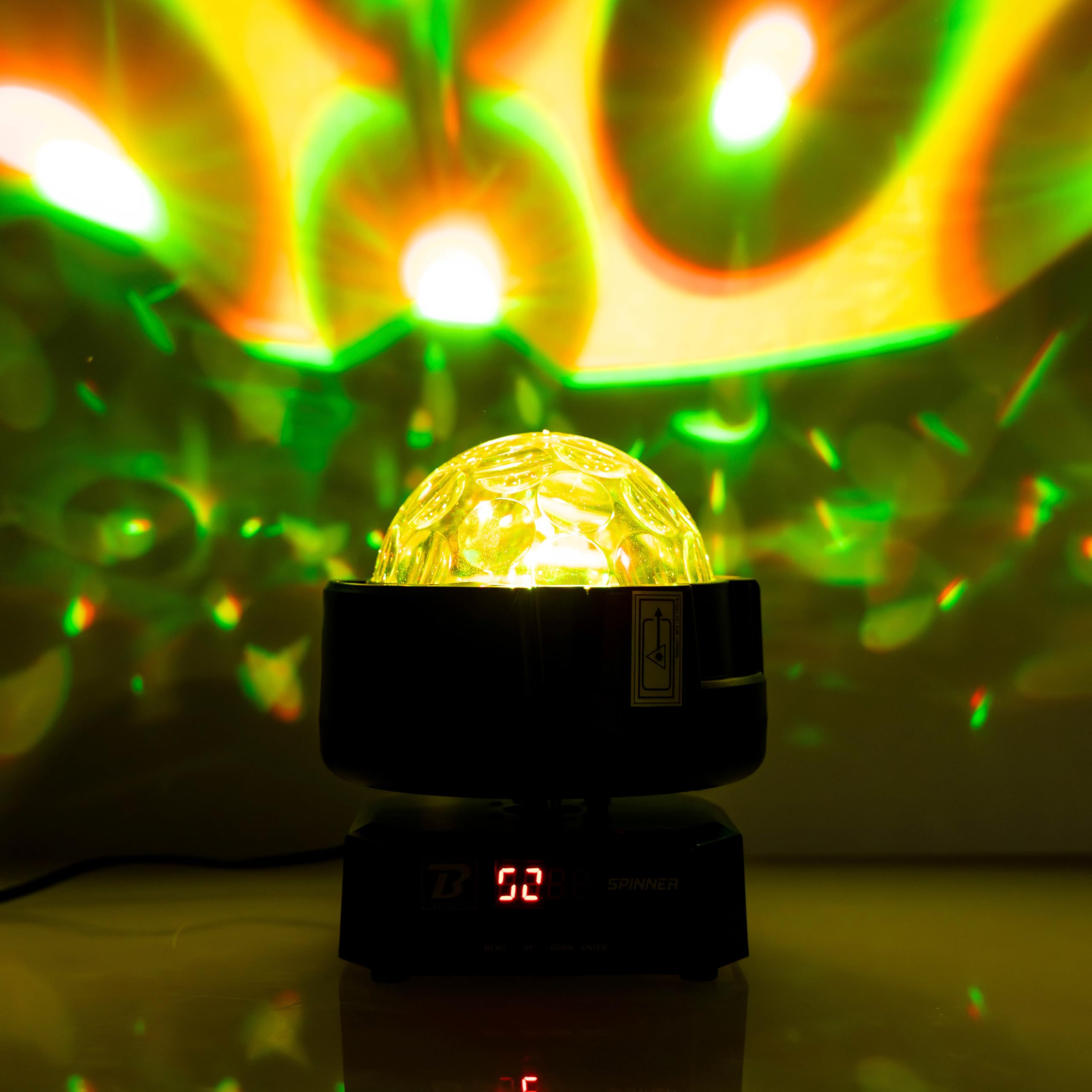 BoomToneDJ Spinner 3-in-1-LED-Lichtspiel, Multi-Strahleffekt, Stroboskop, Lichtstrahlen grün/rot, DMX-Steuerung, IR-Fernbedienung enthalten
