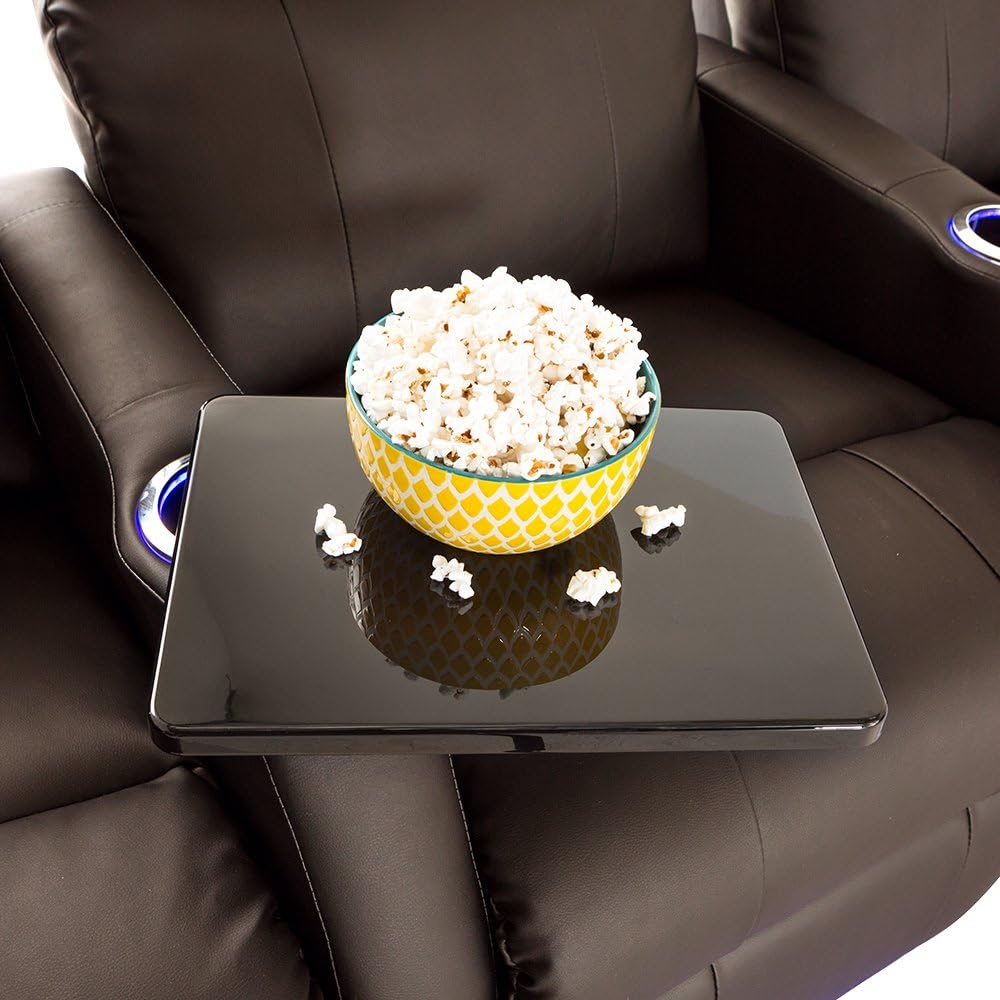 A black removable tray table attached to the armrest of the Seatcraft Sienna Home Theater Seating, holding a bowl of popcorn.