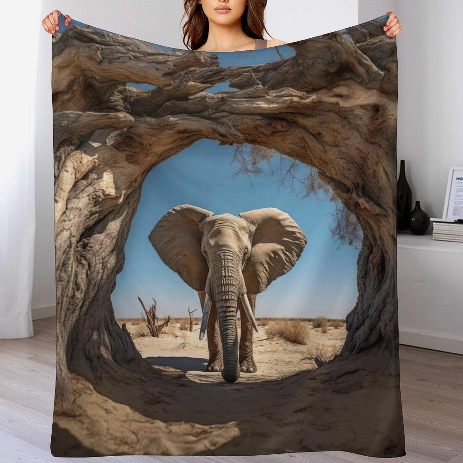 Couverture éléphant chaude pour cocooning sur le canapé du salon
