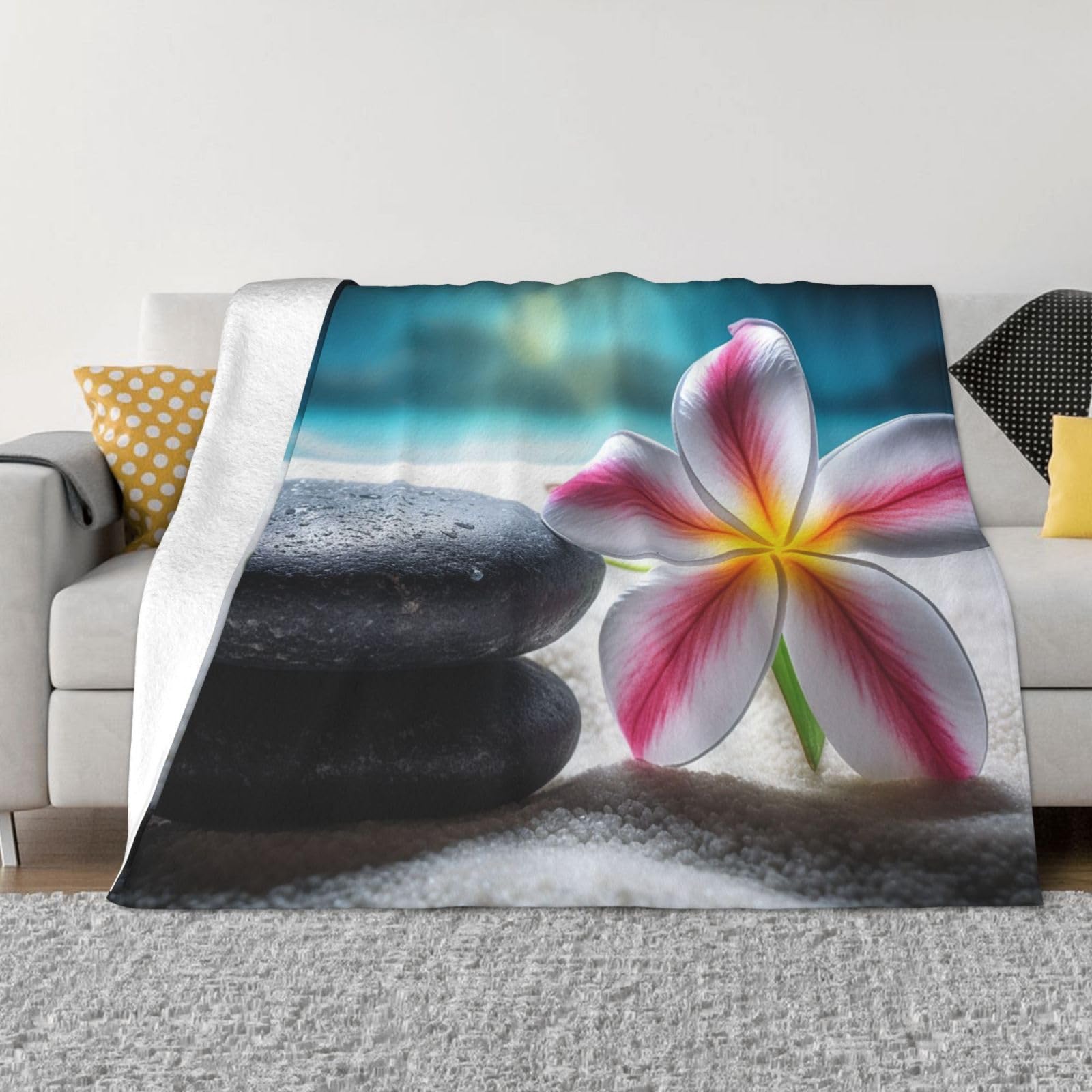 Jeté de lit fleur tropicale pour des soirées cocooning chaleureuses sur le canapé