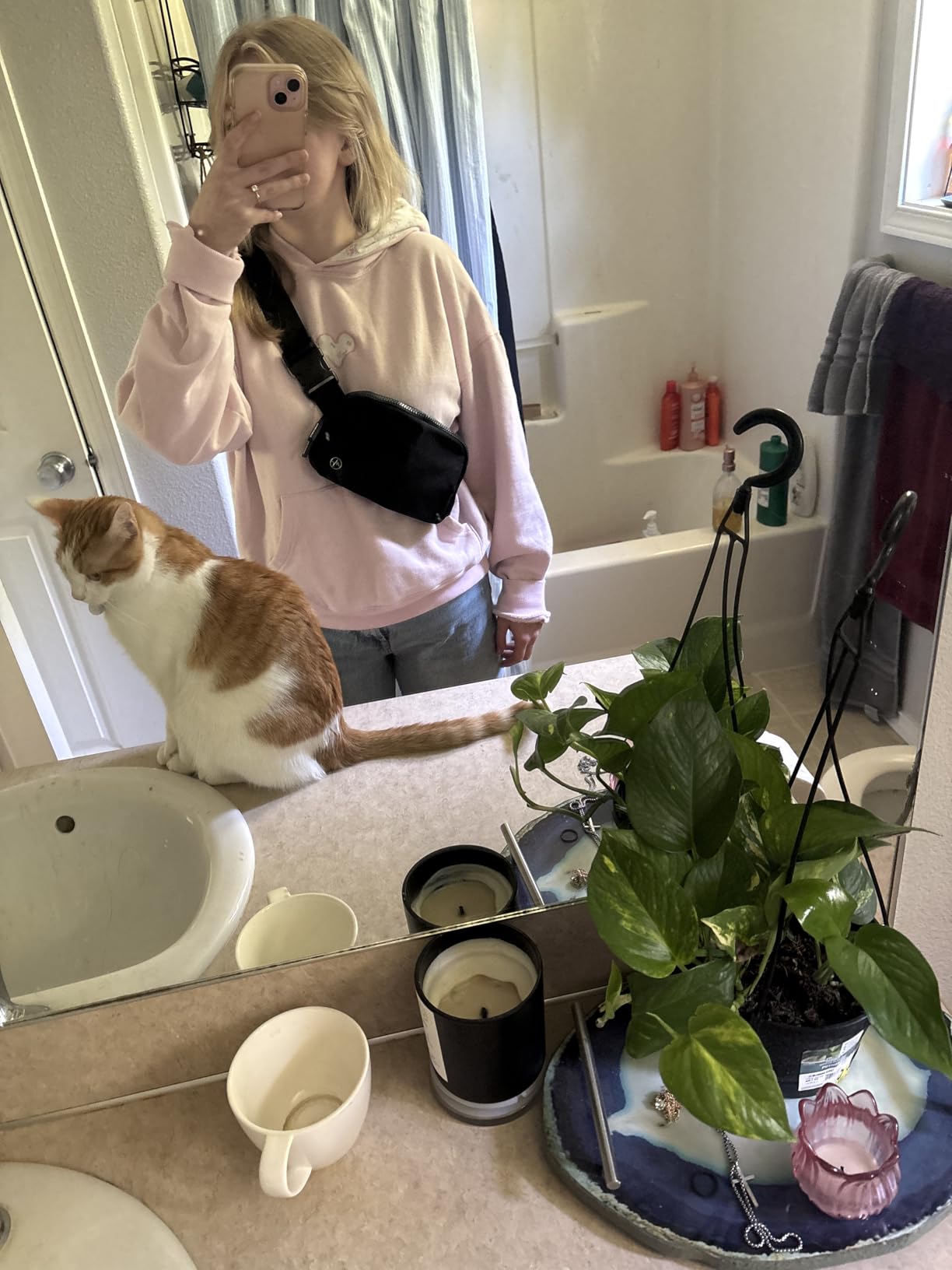Small crossbody bag worn for everyday wear