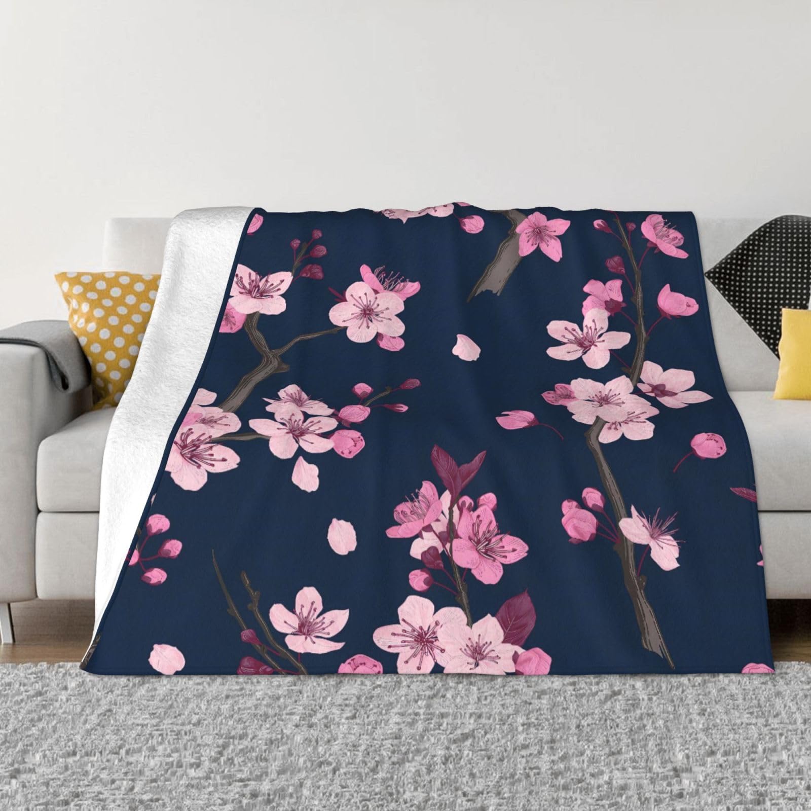 Couverture en flanelle fleurs de cerisier pour canapé et voyage