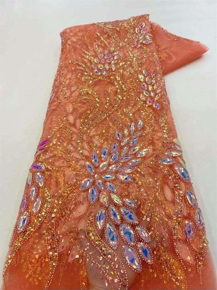 Gruba perłowa koronka i cekinowy tiul na wesele