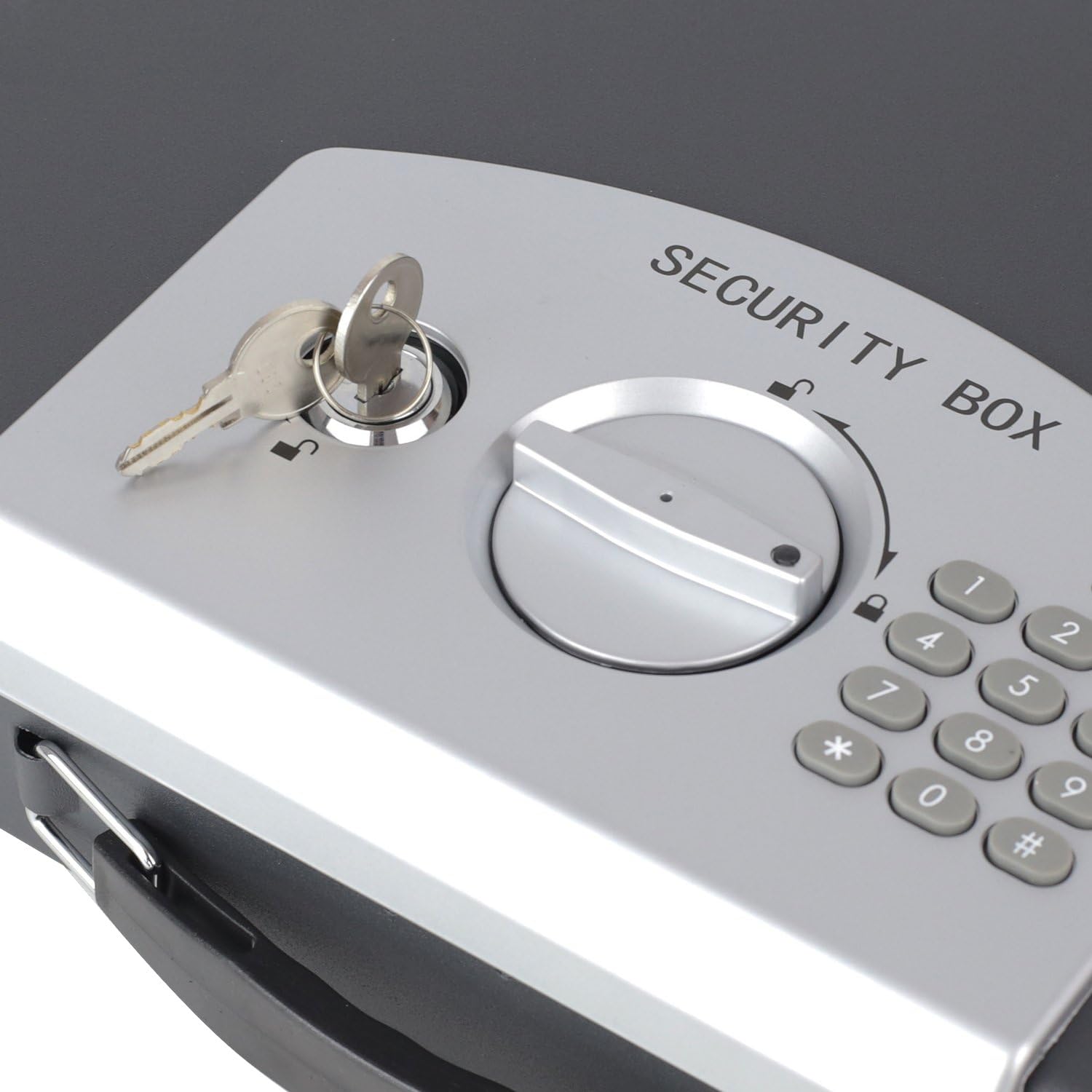 Close-up of the emergency keyhole on the HMF 1608-02 safe's control panel.