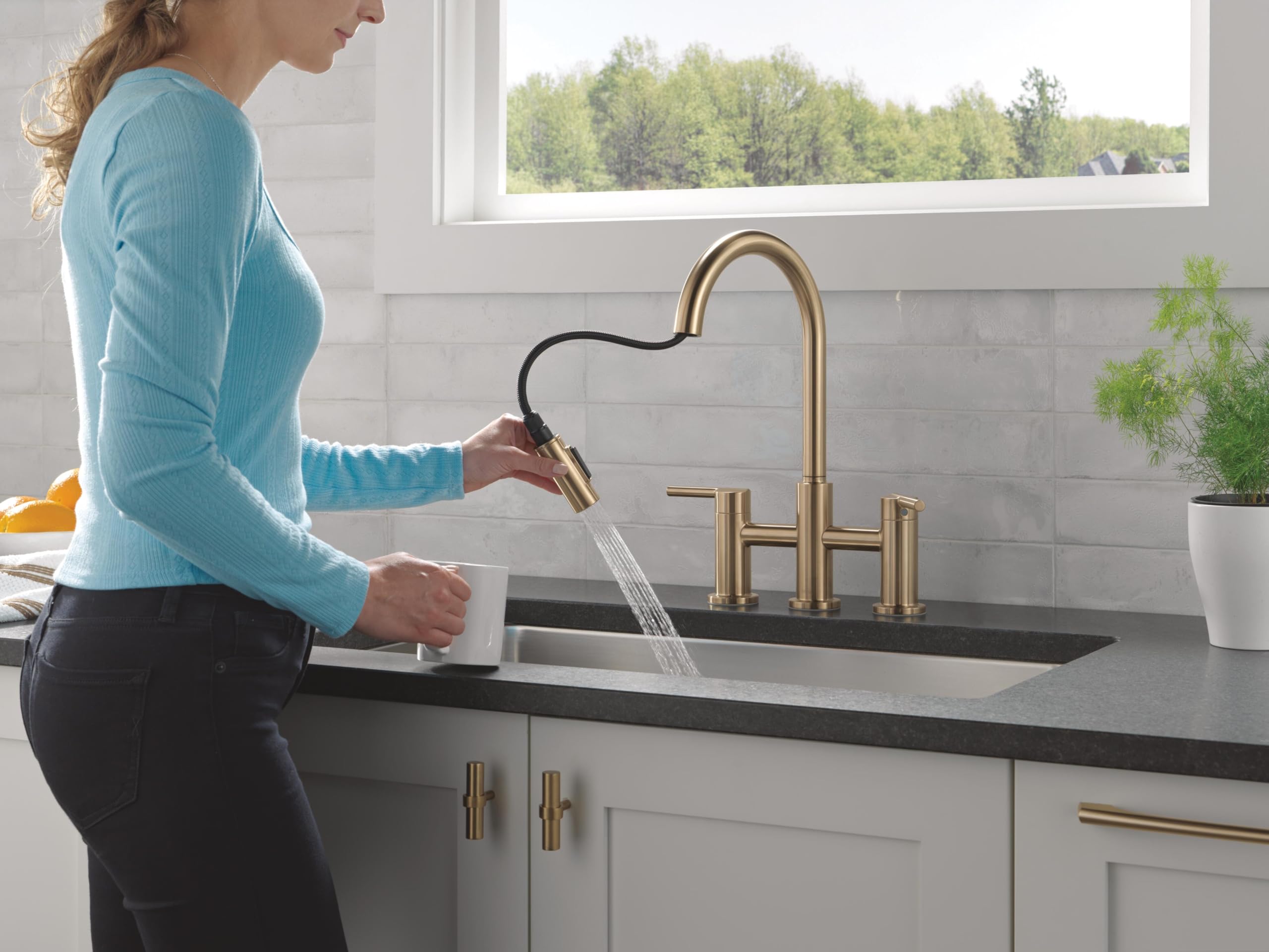 Delta Nicoli Brushed Gold Kitchen Faucet with Pull Down Sprayer