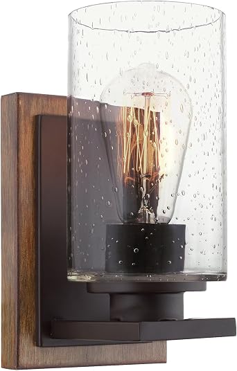 Kira Home Sedona 9" Rustic Farmhouse Wall Sconce with Clear Seeded Glass Shade, Hand-Painted Wood Grain Metal, Walnut Wood and Oil Rubbed Bronze Finish