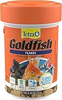 Vista 23 de Tetra Goldfish Flakes, dieta nutricionalmente equilibrada para peces de acuario, copos enriquecidos con vitamina C, 4.52 libras