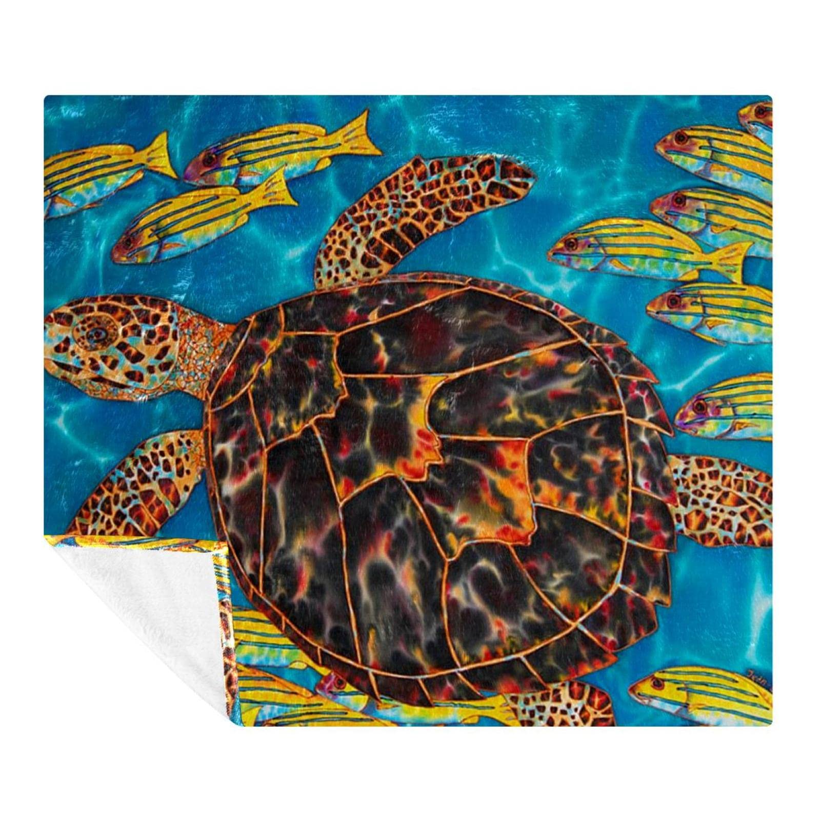 Couverture en peluche poisson tortue pour des moments cocooning sur le canapé