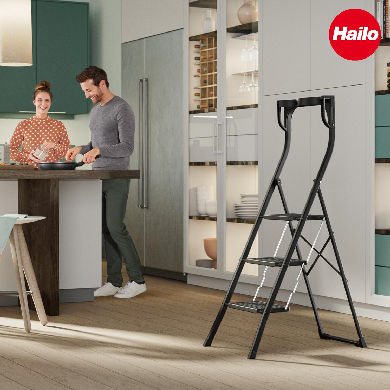 Hailo K77 ComfortLine Klapptritt - 3-stufige Trittleiter aus Stahl mit Sicherheitsbügel und Ablageschale - Arbeitshöhe bis 2,69 m - Gewicht: 6,8 kg - Schwarz