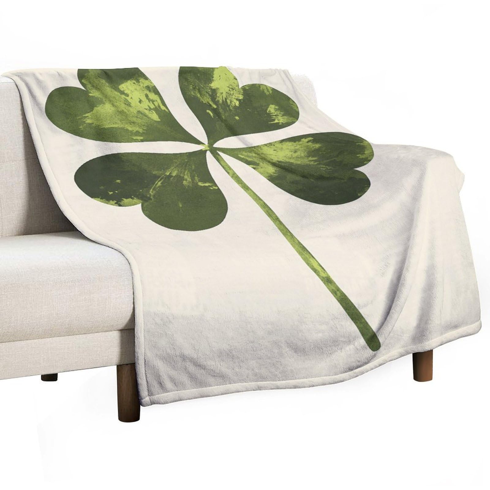Couverture verte anti-boulochage pour des moments cocooning sur le canapé