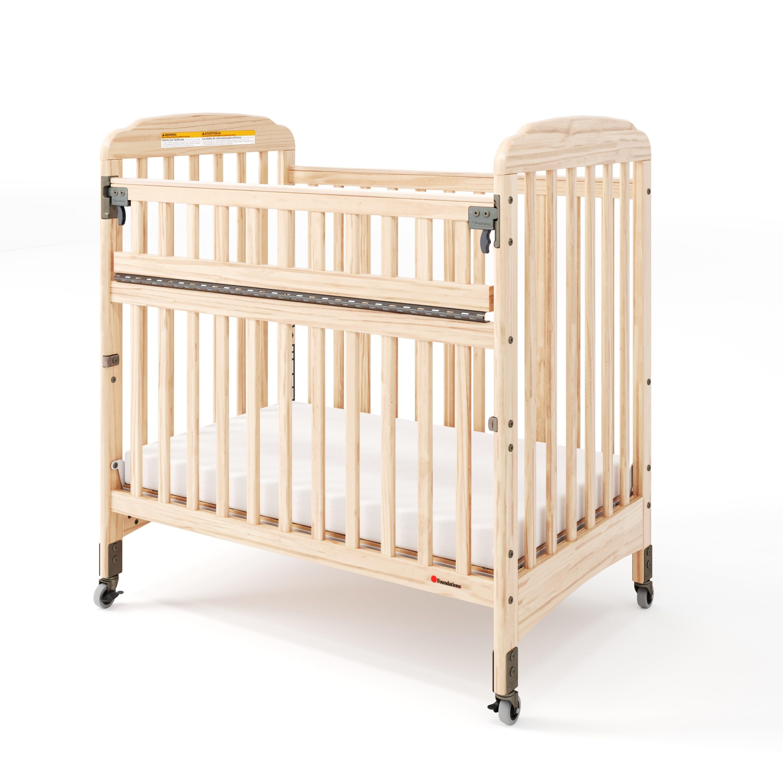 Foundations Serenity SafeReach Slatted Crib with Adjustable Mattress Board, Compact Wooden Baby Crib with Commercial Grade Casters, Includes 3” Foam