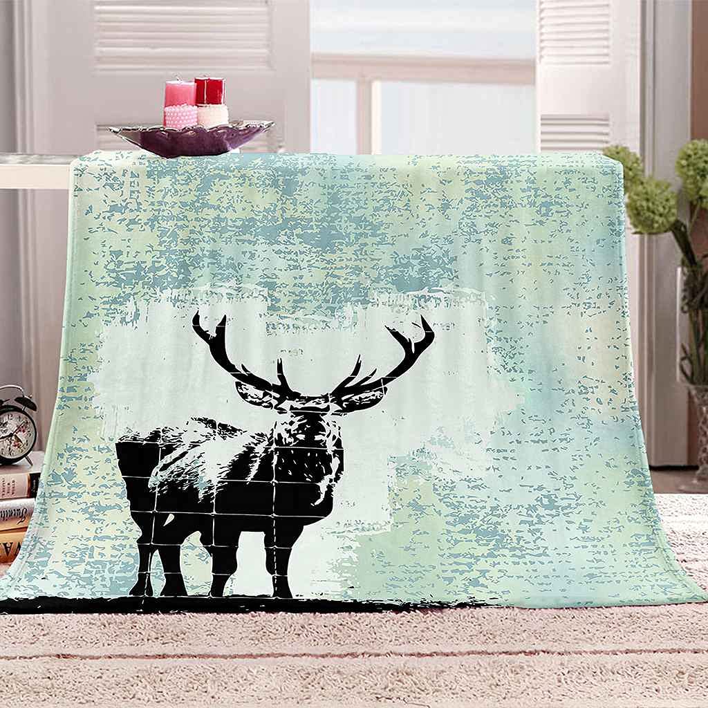 Couverture élan noir en flanelle douce pour vos soirées cocooning au salon