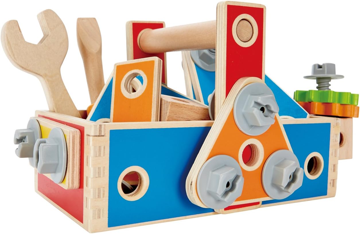 Un primer pla view of the Hape Multifunction Builder Set E8039's wooden toolbox, filled with various wooden and plastic components, including tools.