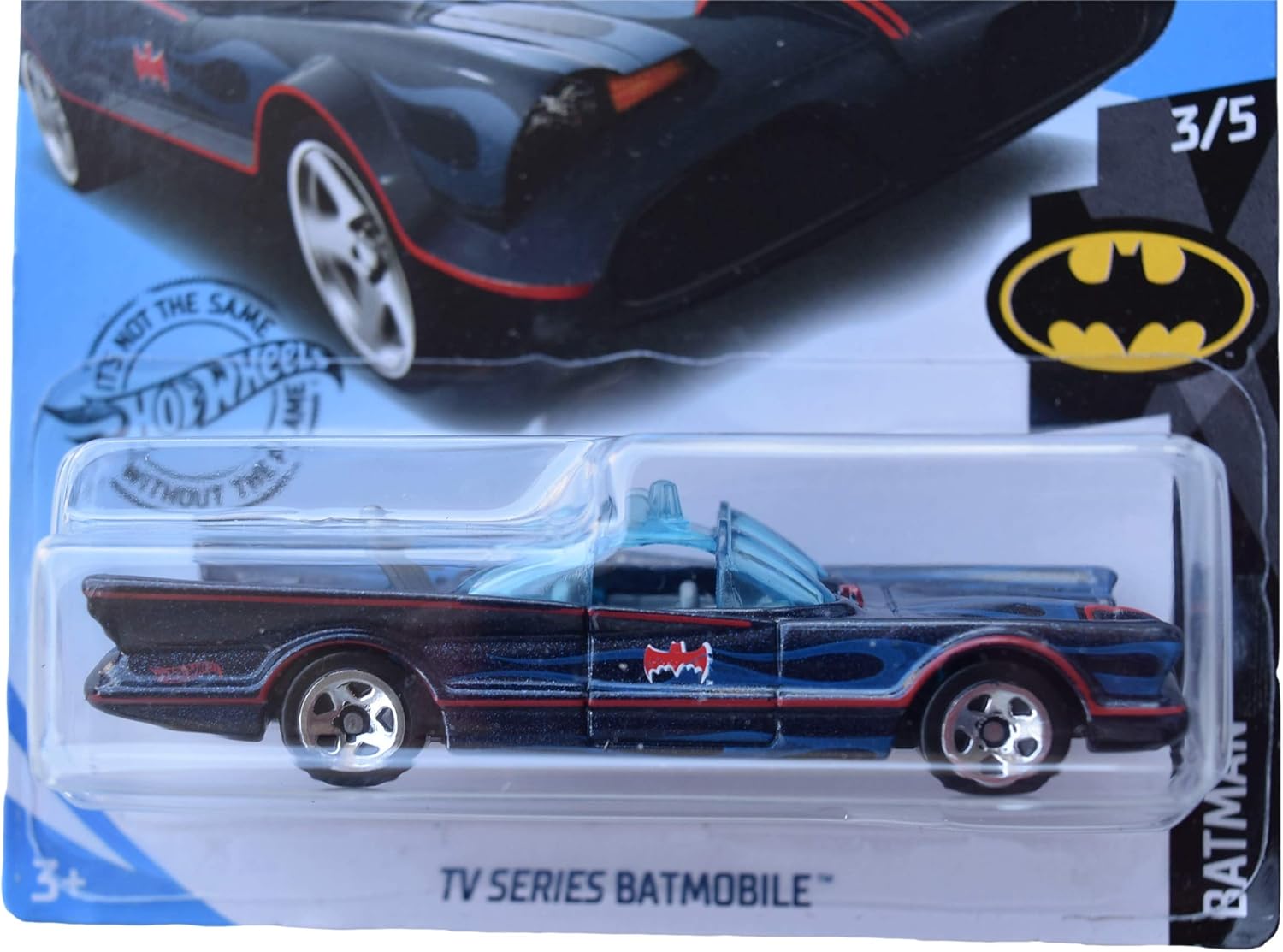 Side view of the Hot Wheels Batmobile 118/250, black with blue flames, showcasing its detailed design and wheels.