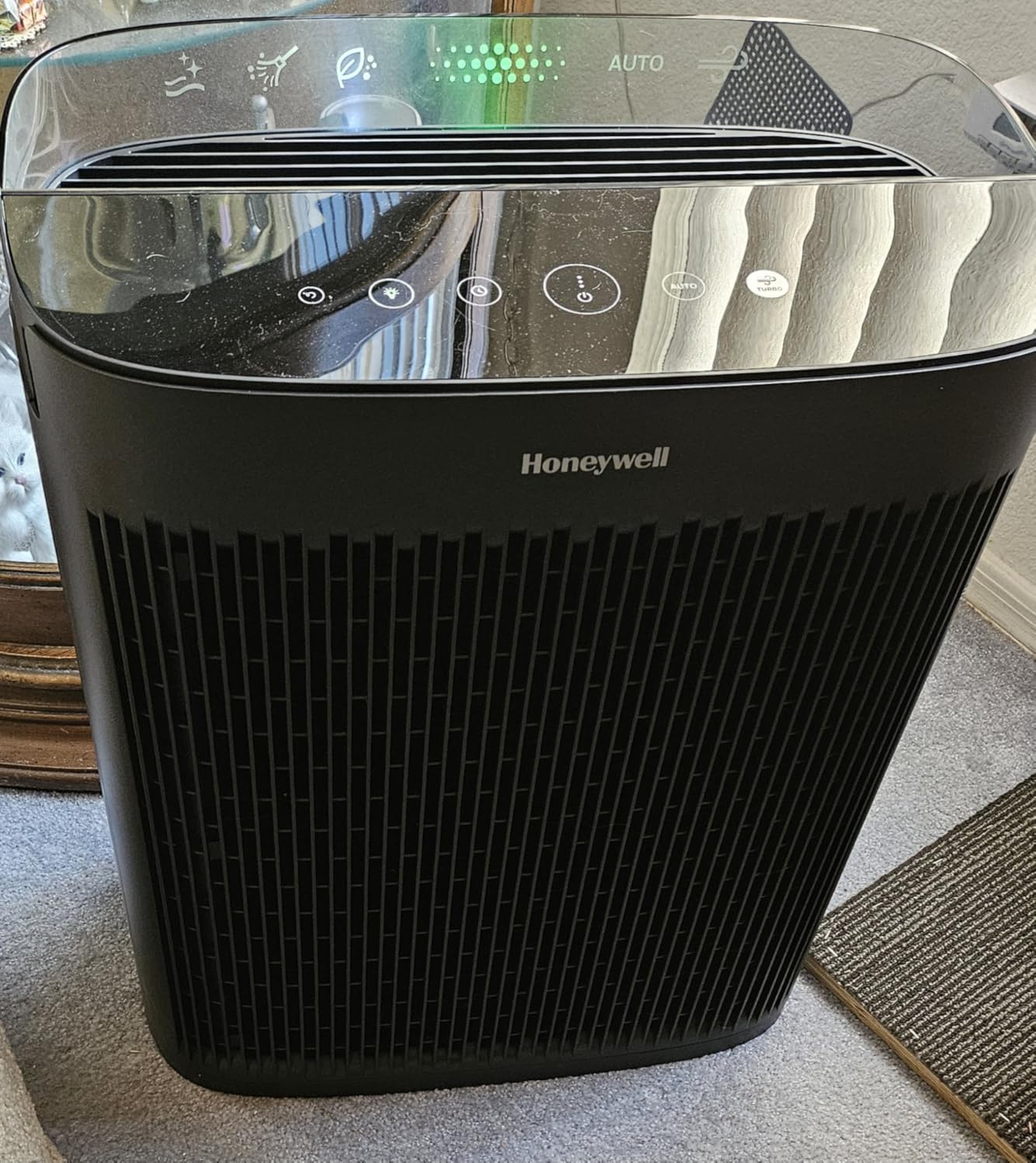 Honeywell HPA5300 air purifier showing sleek black design with illuminated control panel