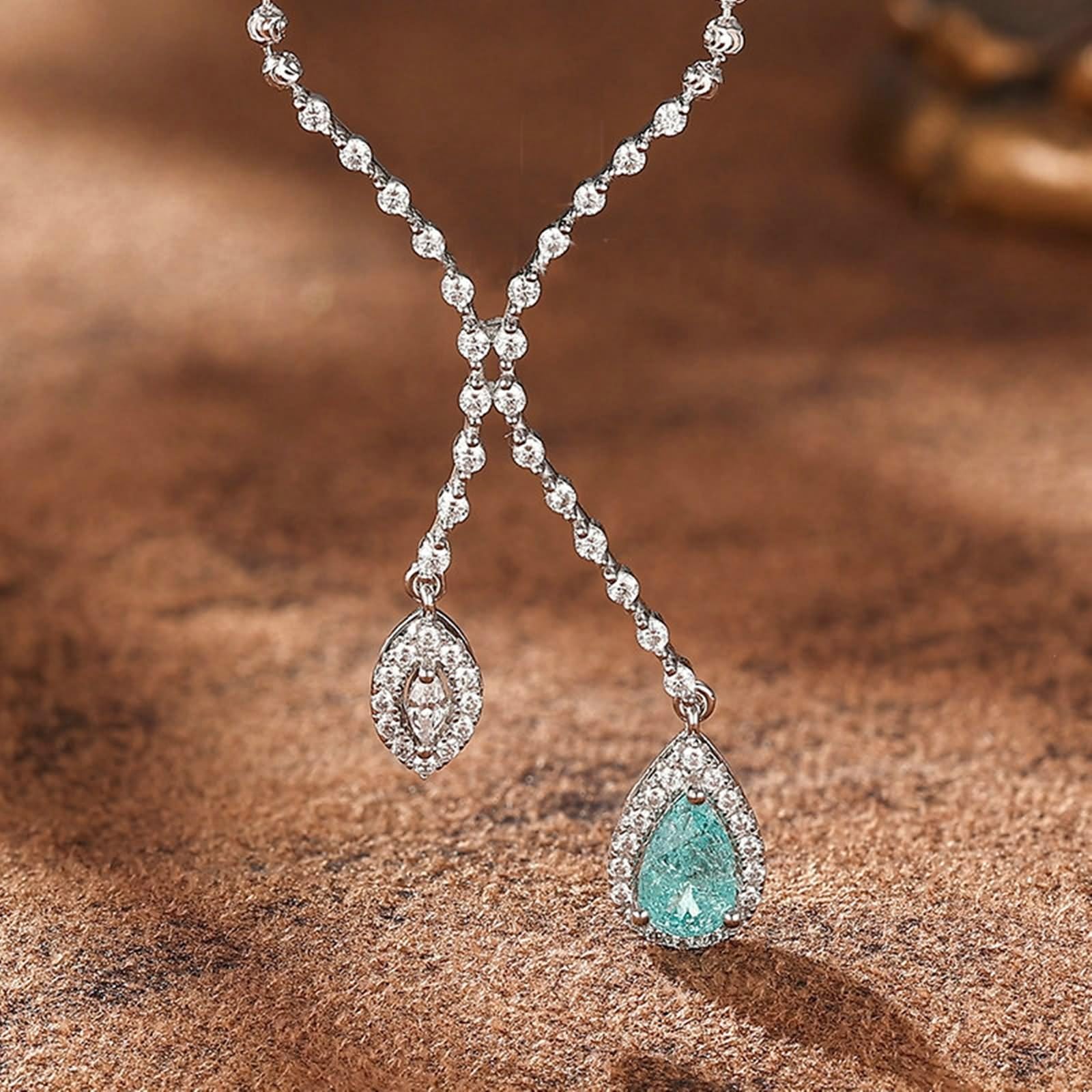 Łańcuszek przyjaźni damski, łańcuszek na szyję z wisiorkiem Infinity z turmalinem Paraiba i moissanit 18-karatowe białe złoto 45 cm