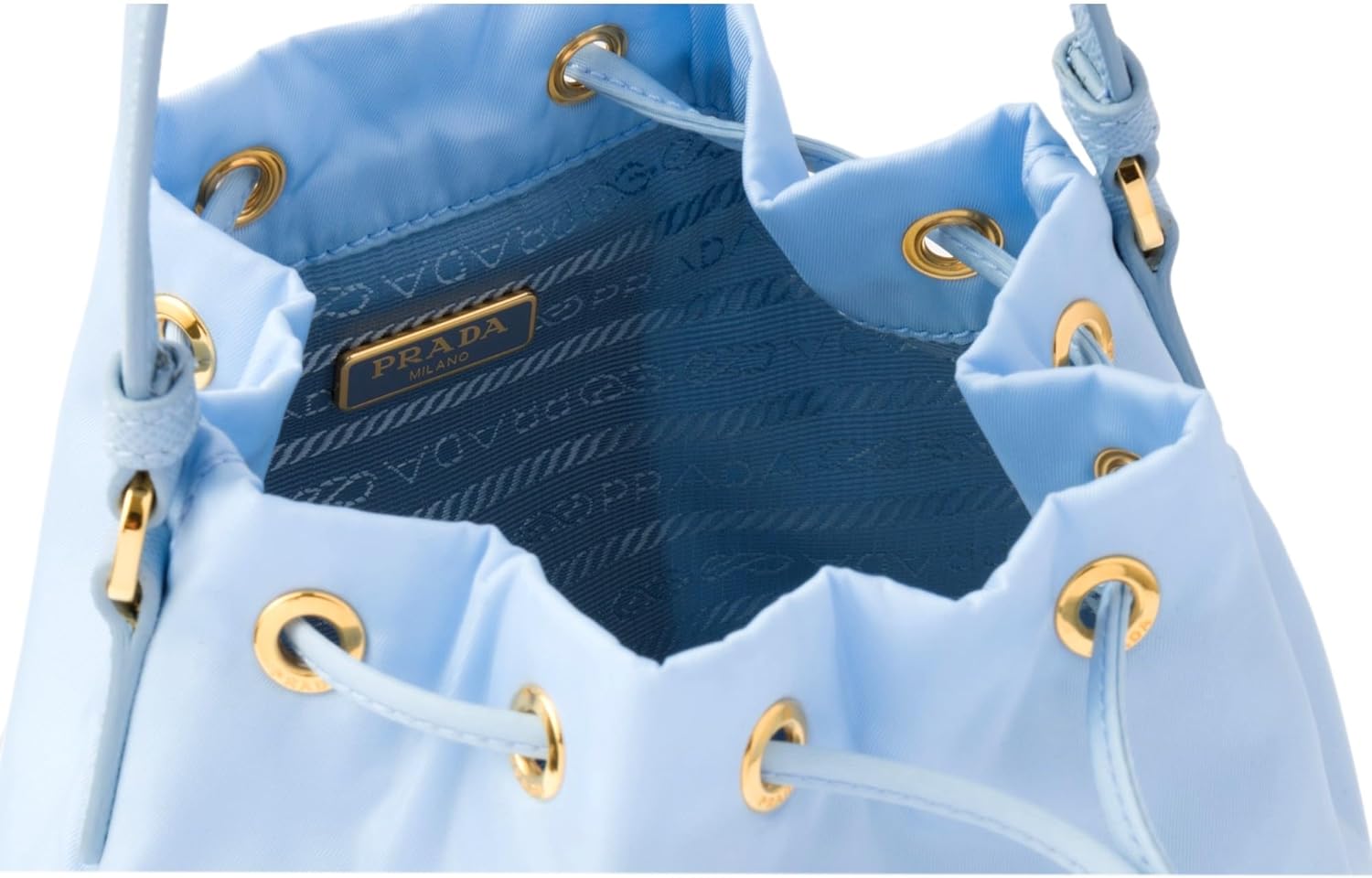 Prada Duet Tessuto Nylon & Ostrich Leather Bucket Bag in Cielo Blue Drawstring Closure Gold-Tone Hardware Detachable Crossbody Strap Made in Italy Includes Dust Bag & Authenticity Cards | Ostrich Leather