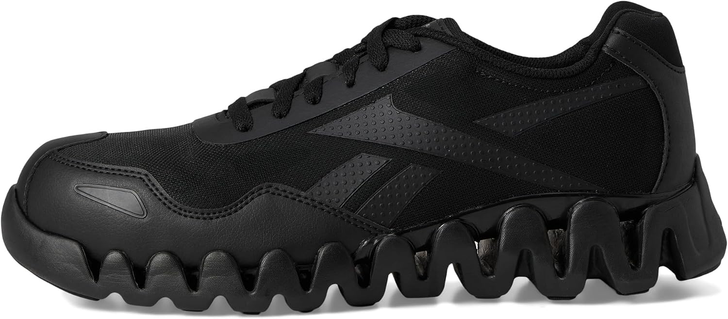 Side profile of the Reebok RB3019 shoe, showing the mesh upper and ZigTech sole
