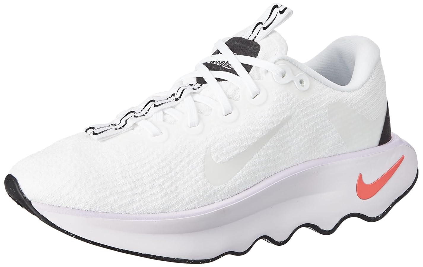 Nike Motiva women's walking shoes in white and lilac colorway displayed against clean background highlighting design details
