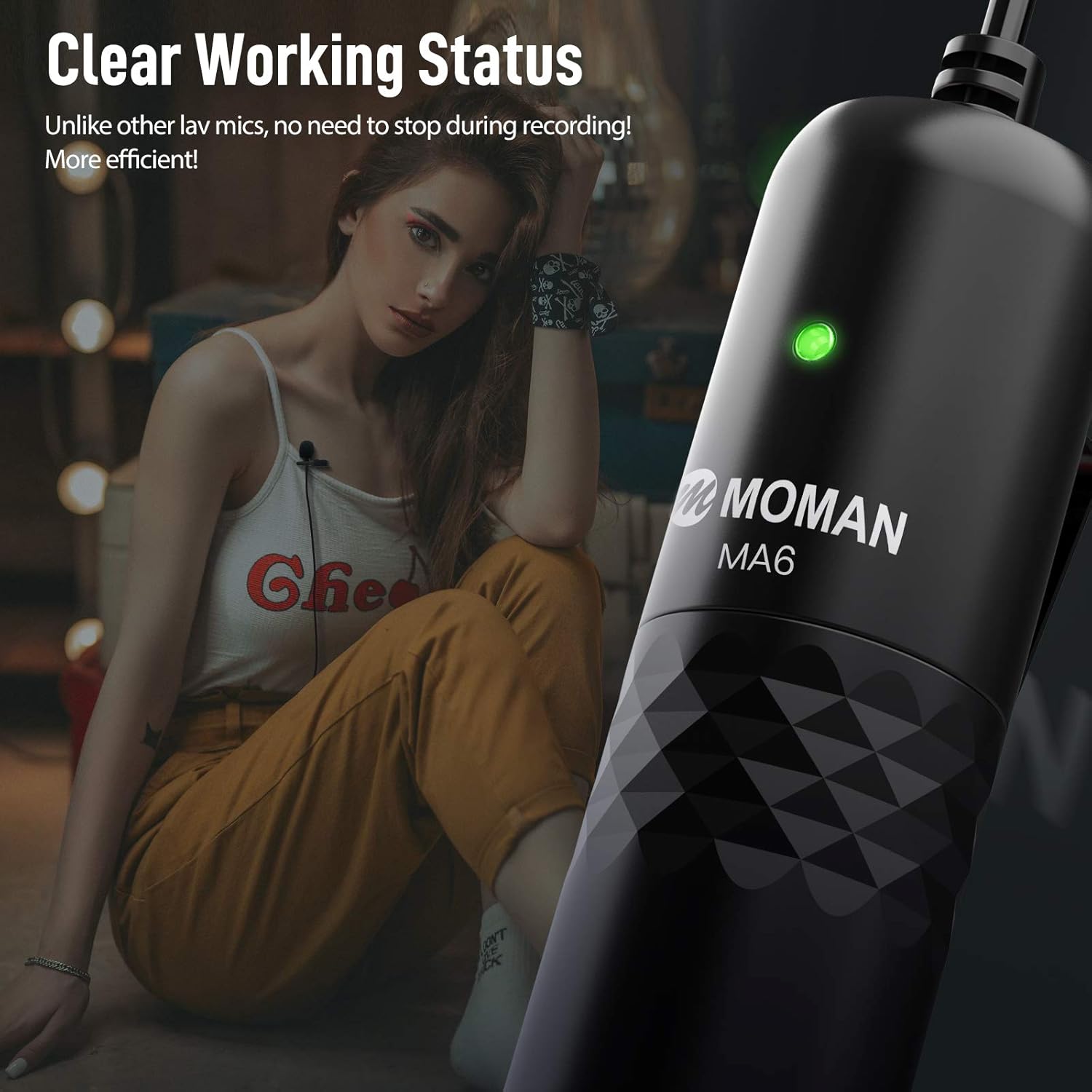 Close-up of the Moman MA6 microphone's main unit showing a green indicator light, signifying clear working status.