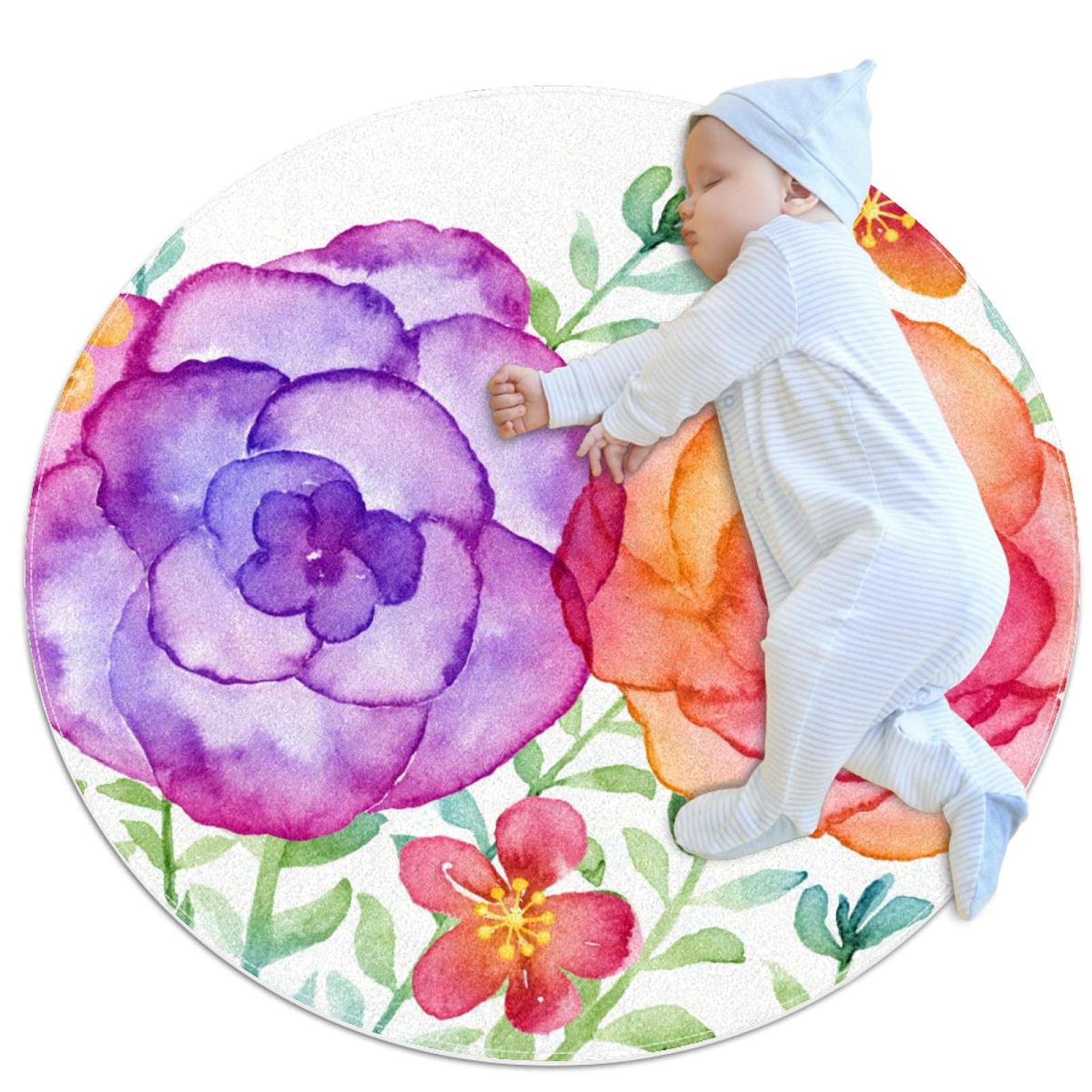 Tapis rond fleurs roses aquarelles pour éveiller les bébés dans leur chambre