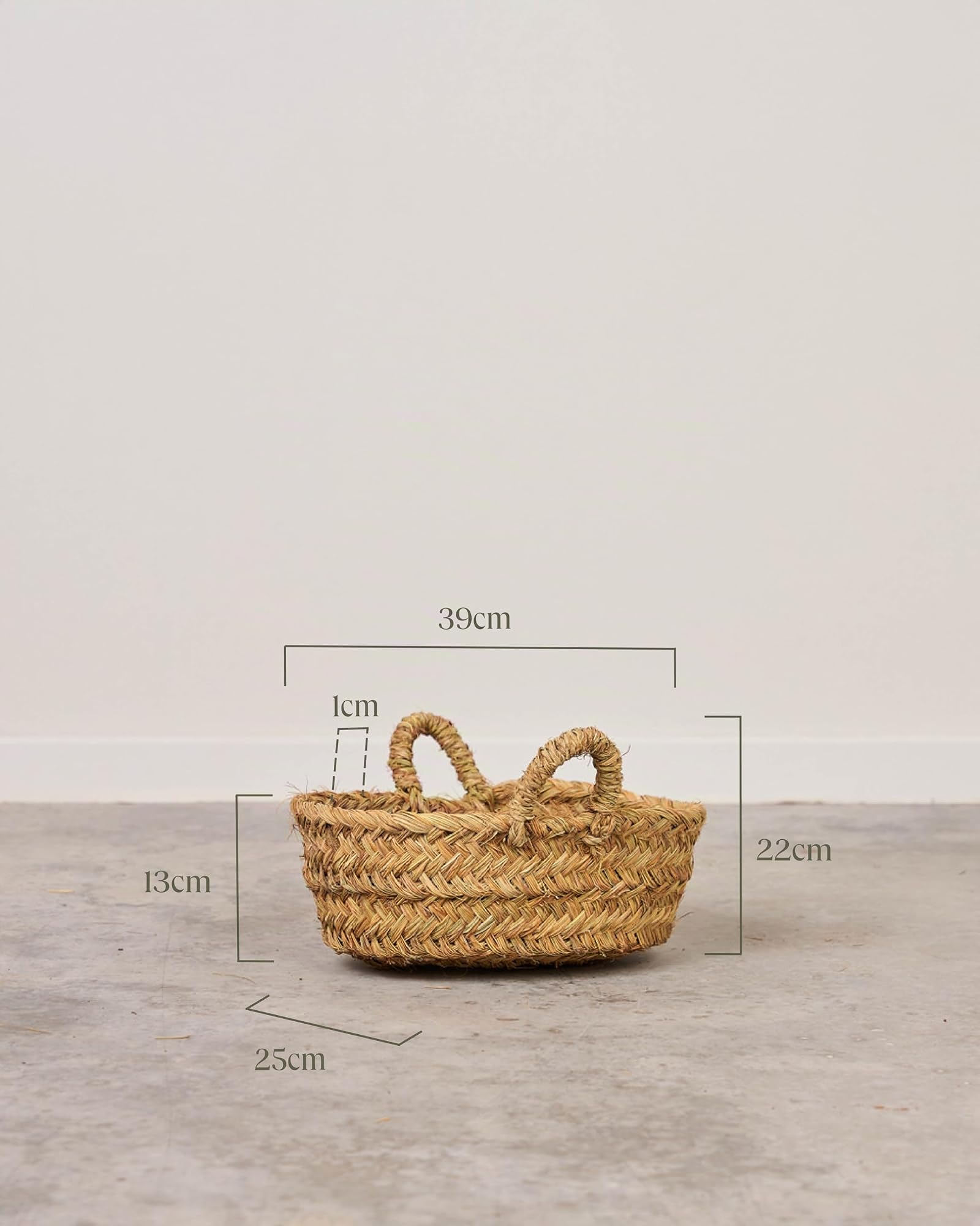 Leñero Esparto con Asas - Cesto Ovalado para Leña y Decoración Rf. 7109-2 | Elaborado a mano con fibras naturales. Resistente, versátil e ideal para leña, mantas, revistas o decoración.