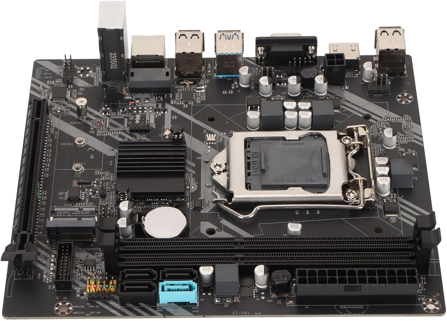 Close-up of the LGA 1155 CPU socket and DDR3 RAM slots on the motherboard