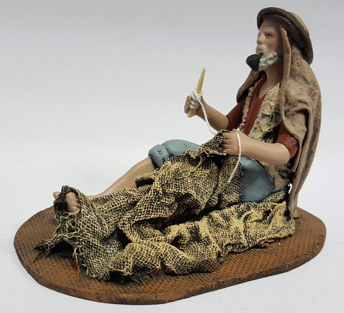 Arte Pesebre - Pastor cosiendo Red, para Figuras de 14 cm.