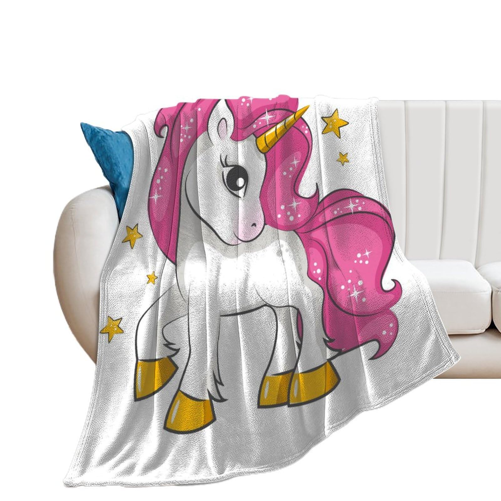 Couverture polaire licorne rose pour des moments cocooning sur le canapé du salon