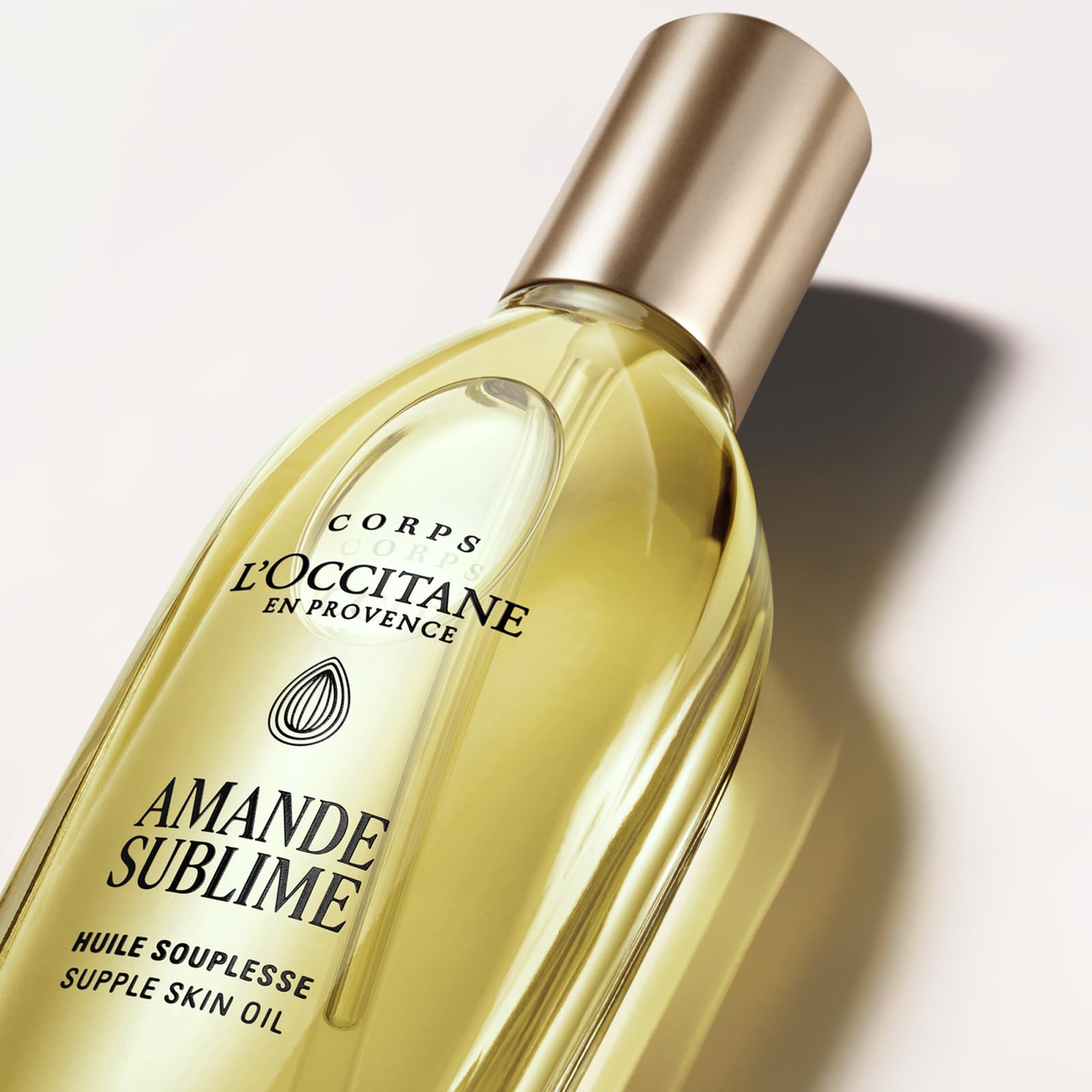 L'OCCITANE - Huile Souplesse Amande Sublime - 100 ml | Tous types de peau - Lisse et améliore l'élasticité de la peau - Fabriqué en France