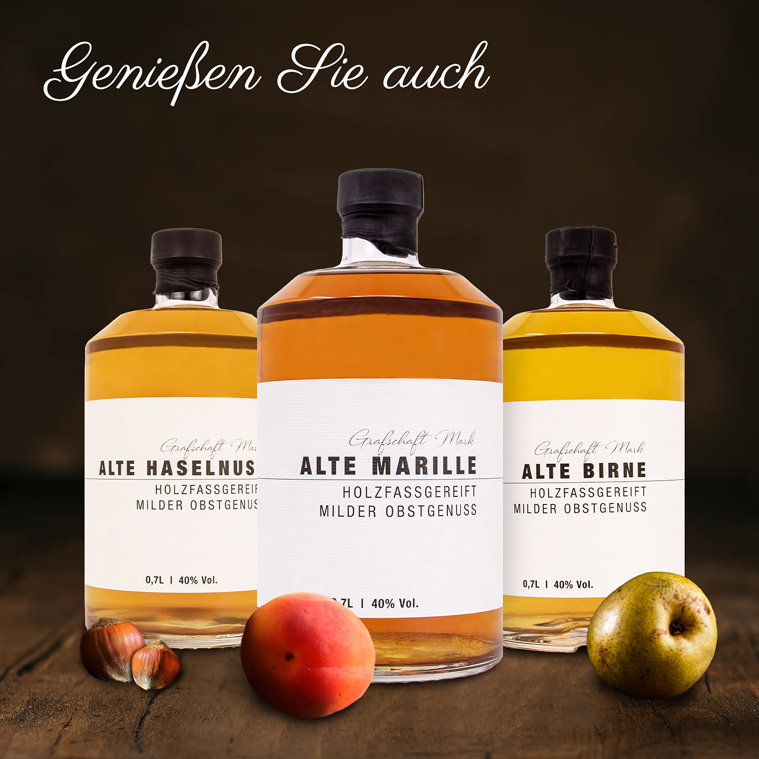 Grafschaft Mark Alte Marille Schnaps Geschenkset | 1x 0,7 L & 2x 0,02 L | 40% Alkohol | edle Holzbox mit Marillenbrand, Birnenbrand, Haselnussbrand | Obstler im Holzfass gelagert | Schnaps Geschenk