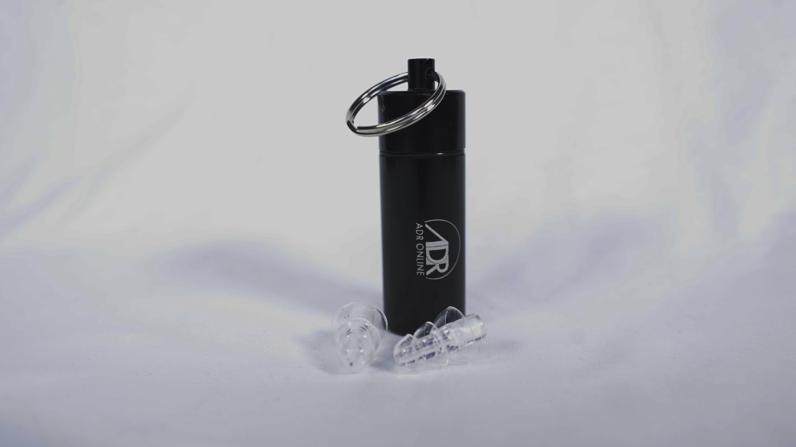 ADR Ear Plugs - Comfortable and Reusable Hearing Protection - Made From Environmentally Friendly Soft Silicone - Perfect For Studying, Working, Music Rehearsals, Traveling, Festivals and Concerts - Storage Canister Provided For On The Go Use - 100% Satisfaction Guaranteed (Clear)