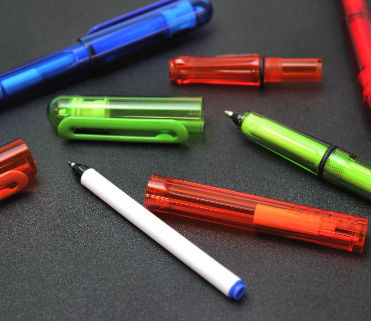 LAMY T11 Wkład do długopisu kulkowego, zestaw 24 szt. z dużym zapasem atramentu i końcówką do pisania ze stali nierdzewnej w kolorze niebieskim (zmywalnym) do długopisu kulkowego model 311 Lamy