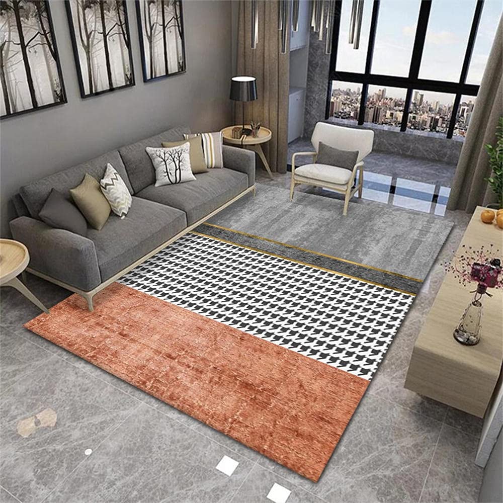 Tapis géométrique orange et noir 160x230cm au motif graphique simple