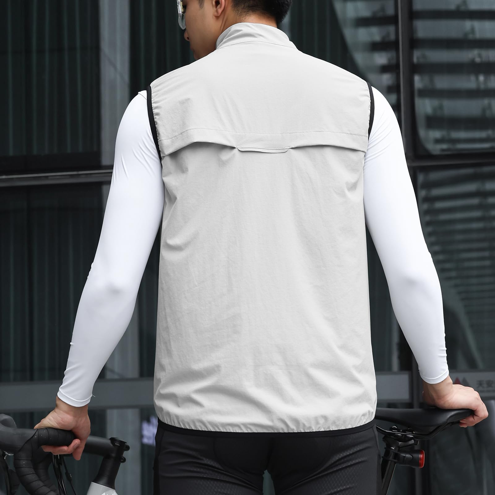 Gilet de cyclisme d'été ultraléger respirant sans manches imperméable et coupe-vent avec protection solaire et bandes réfléchissantes idéal pour le VTT et la course à pied