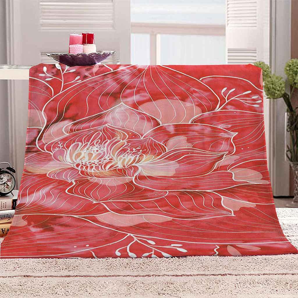Couverture flanelle lotus rose pour éliminer les frissons sur votre canapé
