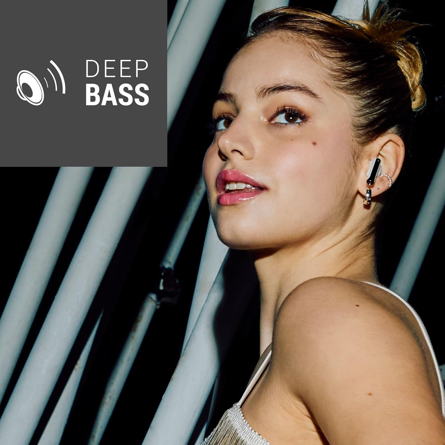 Energy Sistem StyleBuds earbuds inside their open charging case.