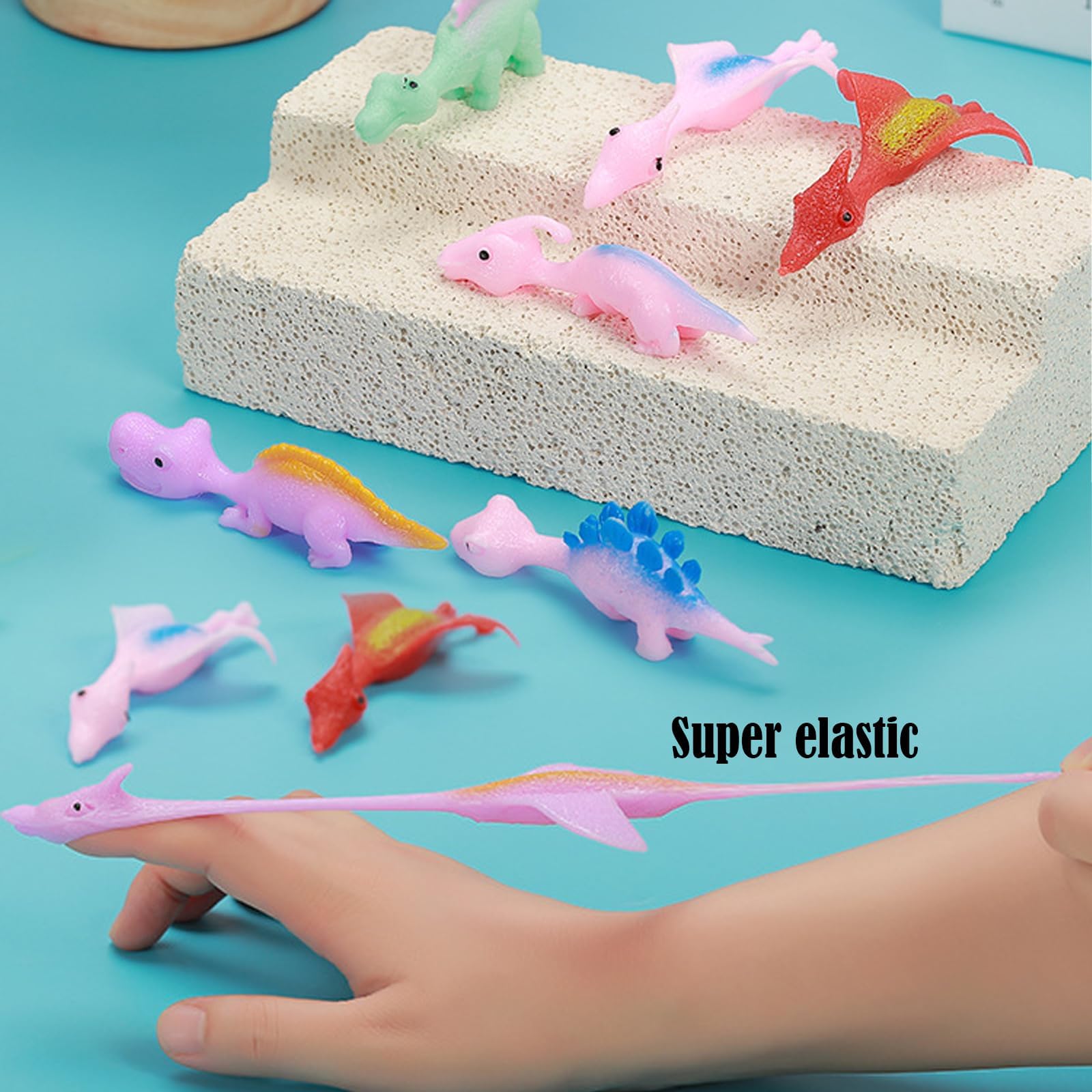 DKDDSSS 20 PCS Juguetes de Dinosaurios, Tirachinas Dinosaurios Juguetes Elásticos, Muy adecuados para Juegos y Fiestas de Vuelo