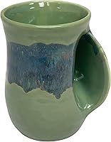 Vista 2 de Clay in Motion - Taza calentadora de manos para diestros, diseño Misty Green