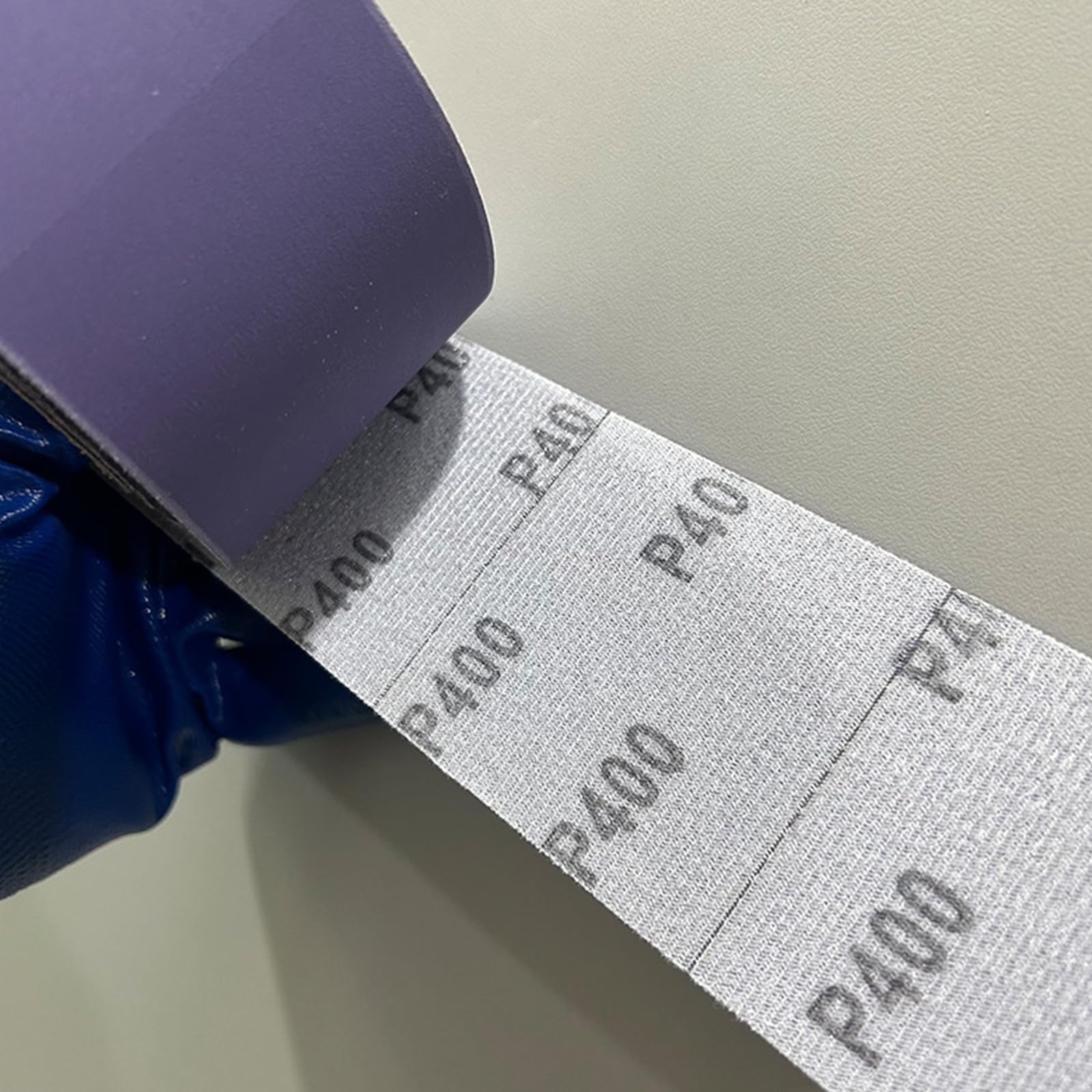 Rollo de lijado de acabado 70 mm x 12 m con malla perforada 500